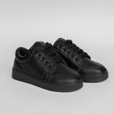 Kids black sneakers