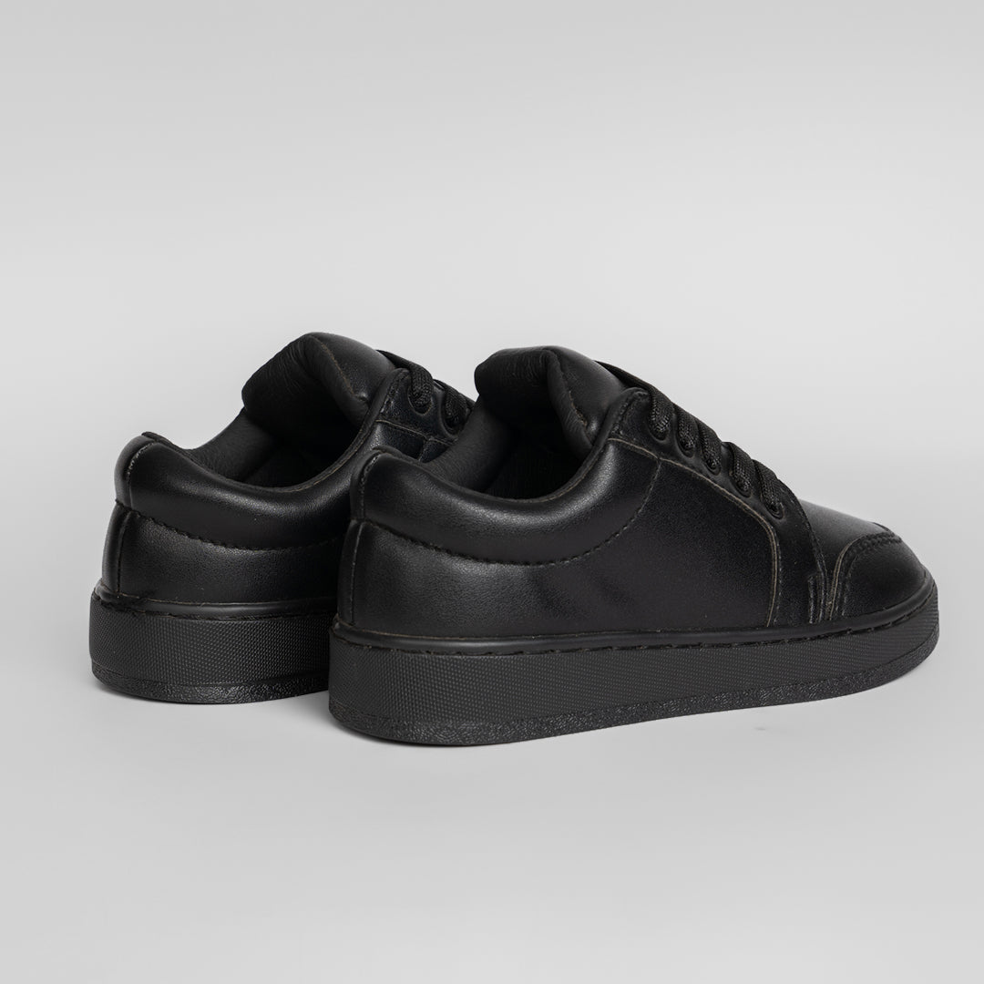 Kids black sneakers